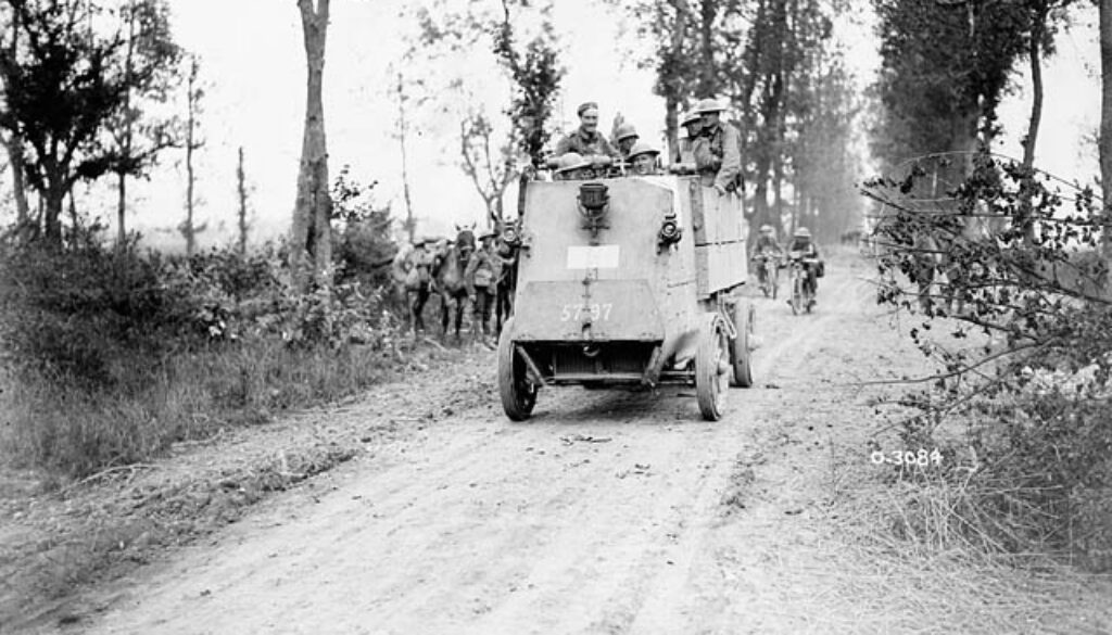 65_A Canadian armoured car going into action. Battle of Amiens.